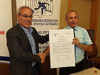 2014ISRUnifiedLeagueSigning1.jpg