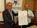 2014ISRUnifiedLeagueSigning1_small.jpg
